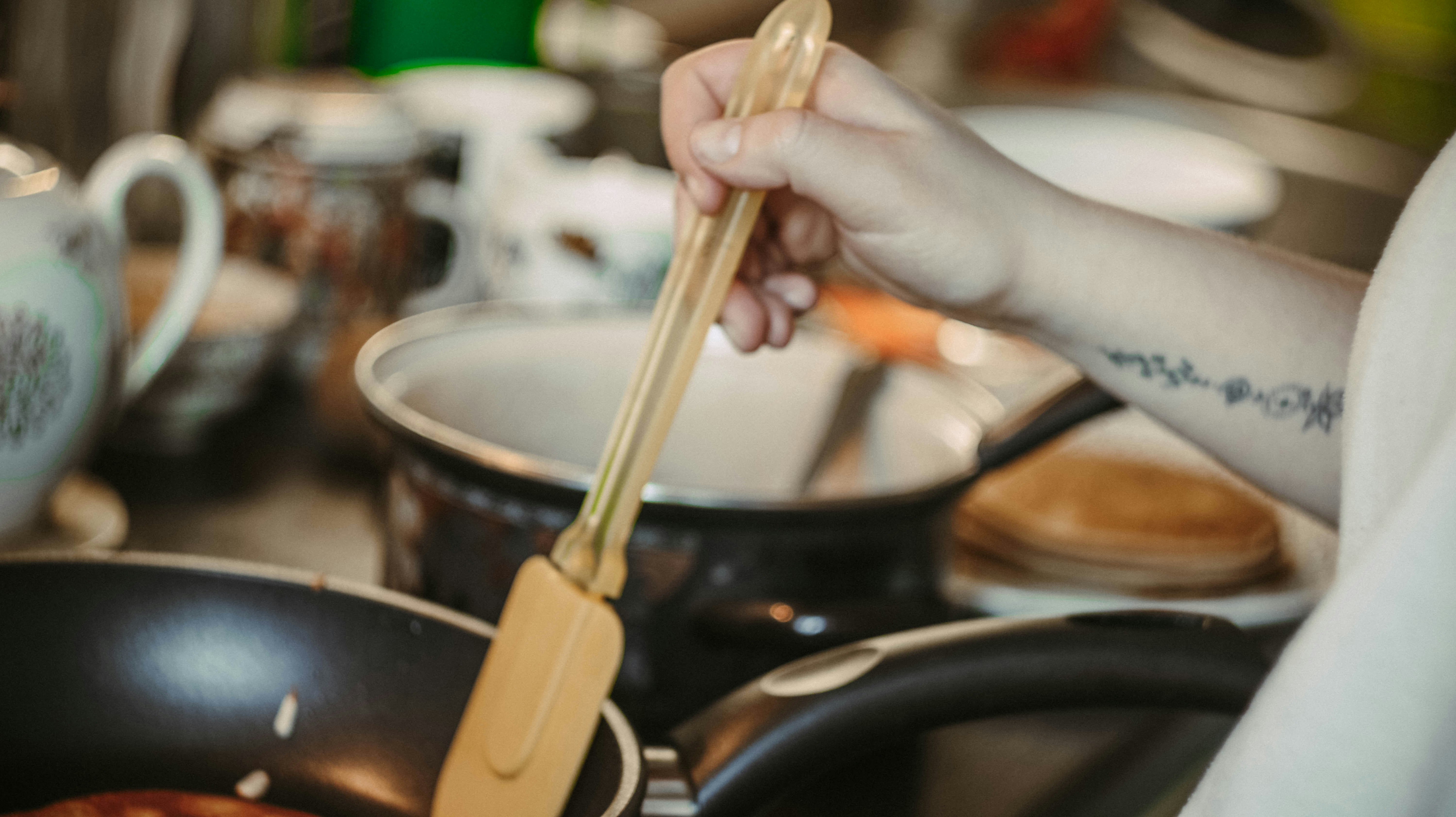 person holding fork and knife